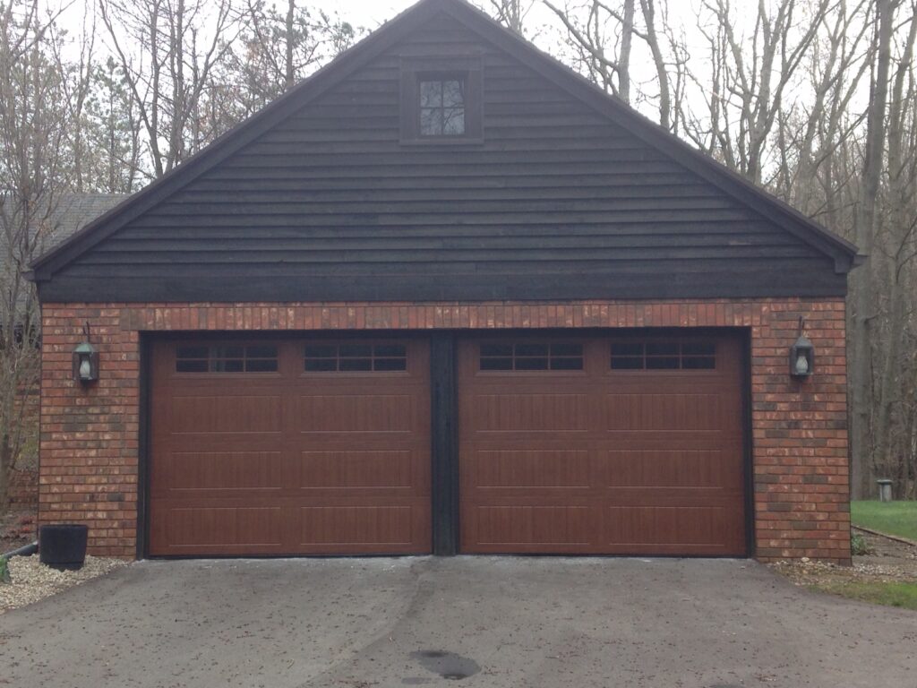 Start the process of installing a new garage door, like this brown door, with Environmental Door.