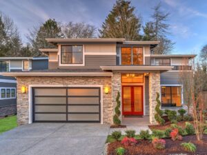 Adding windows to your garage door can be simple, like row, or modern and complex (shown) where windows are the primary panels.