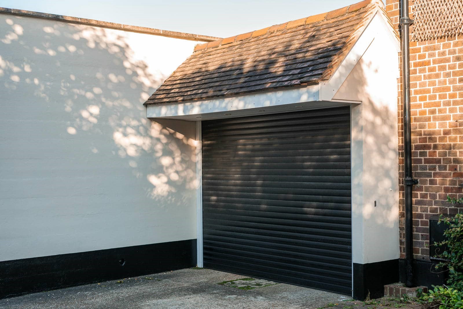 Modern garage door with sloped roof