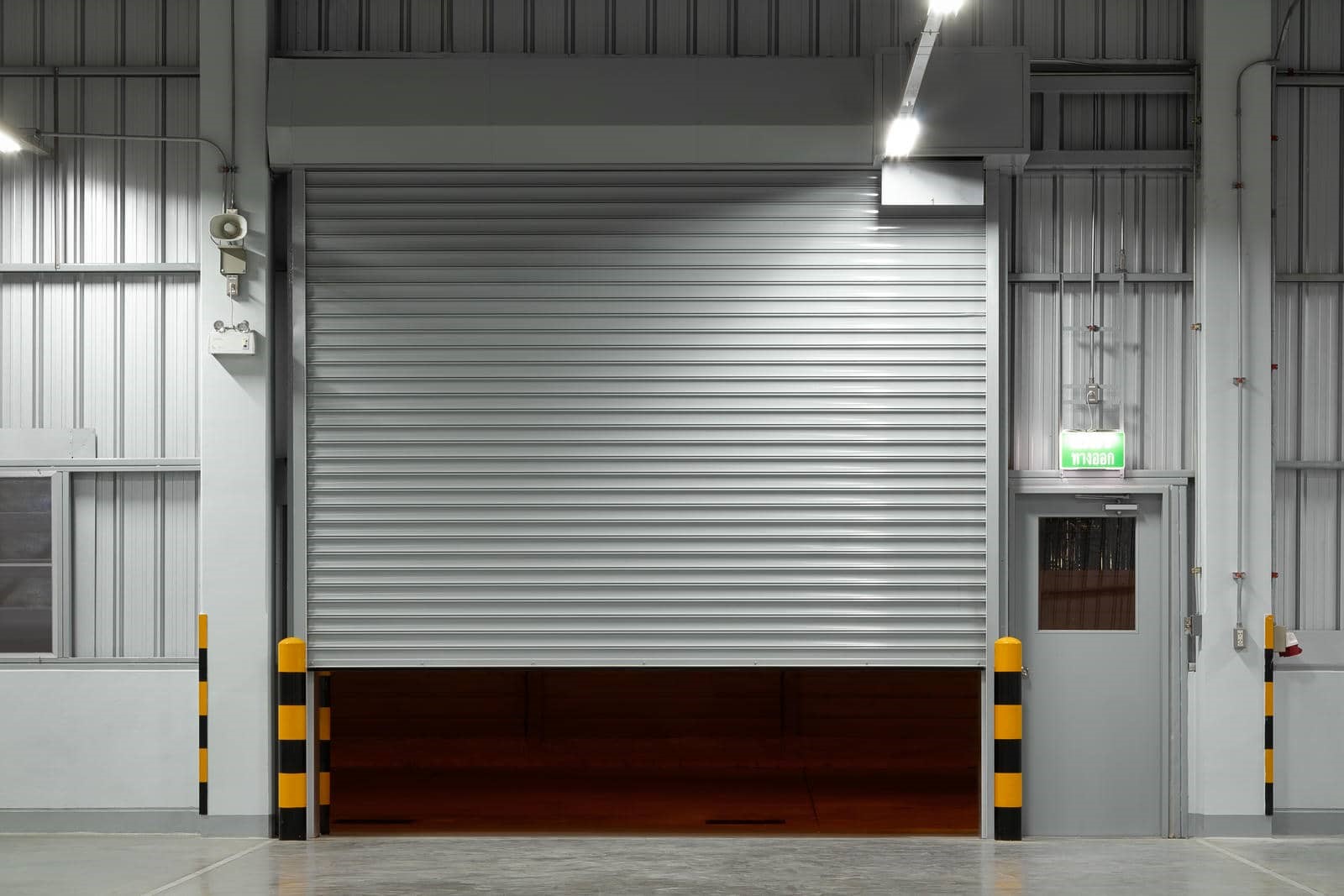 Commercial Garage Door Maintenance: A Schedule That Prevents Downtime