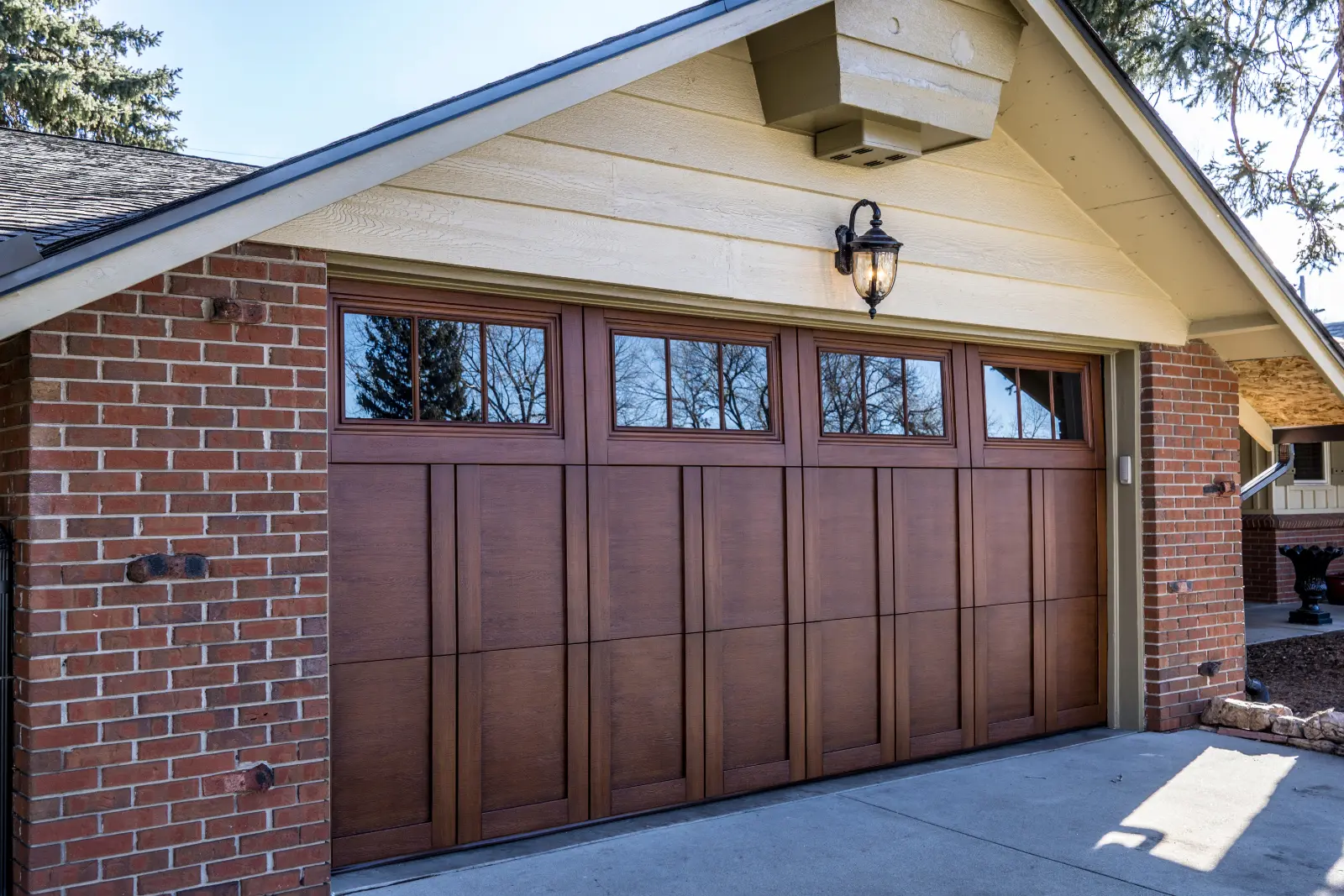 Custom Wood Overlay Garage Door on a house with Residential Garage Door Installation