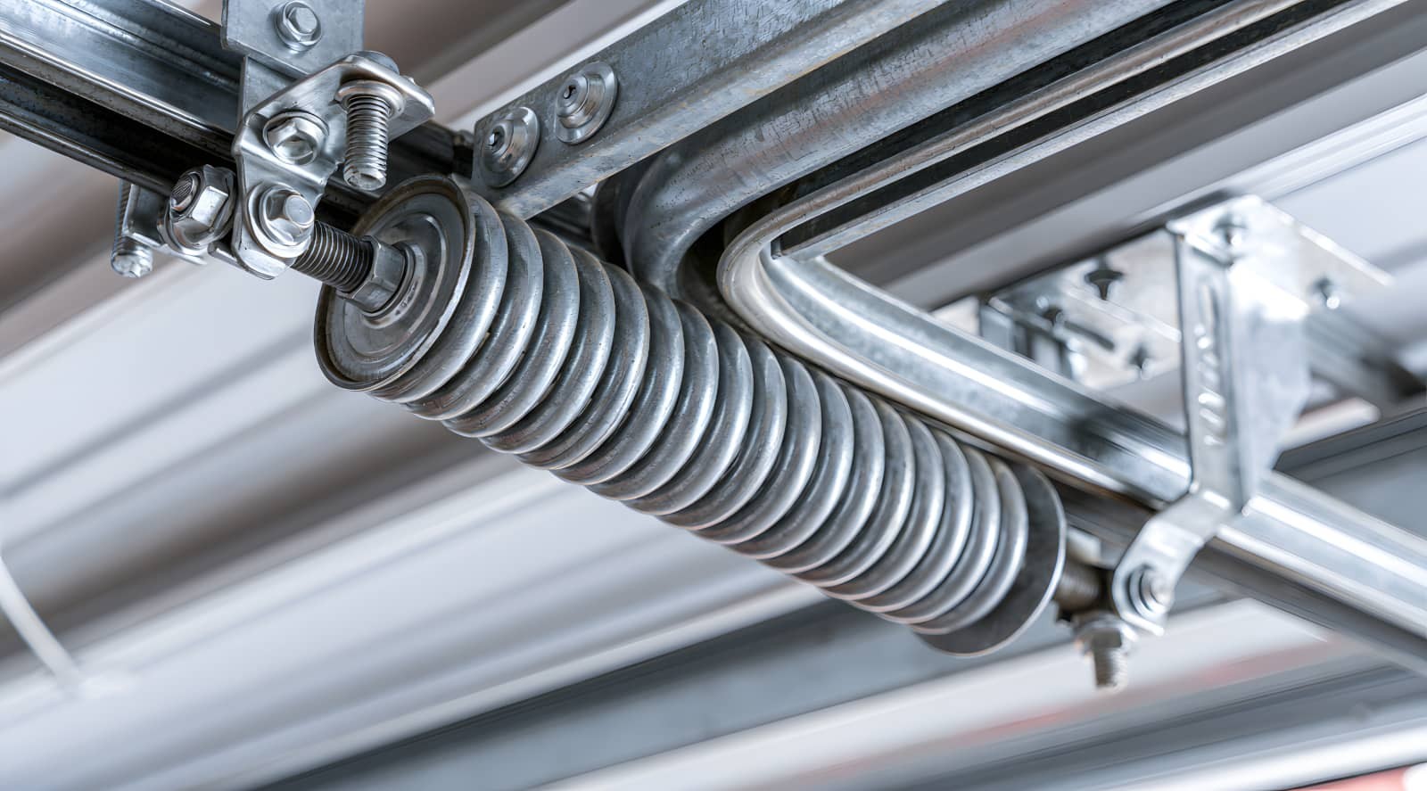Garage Door Spring Lifespan: What Determines When Yours Will Snap