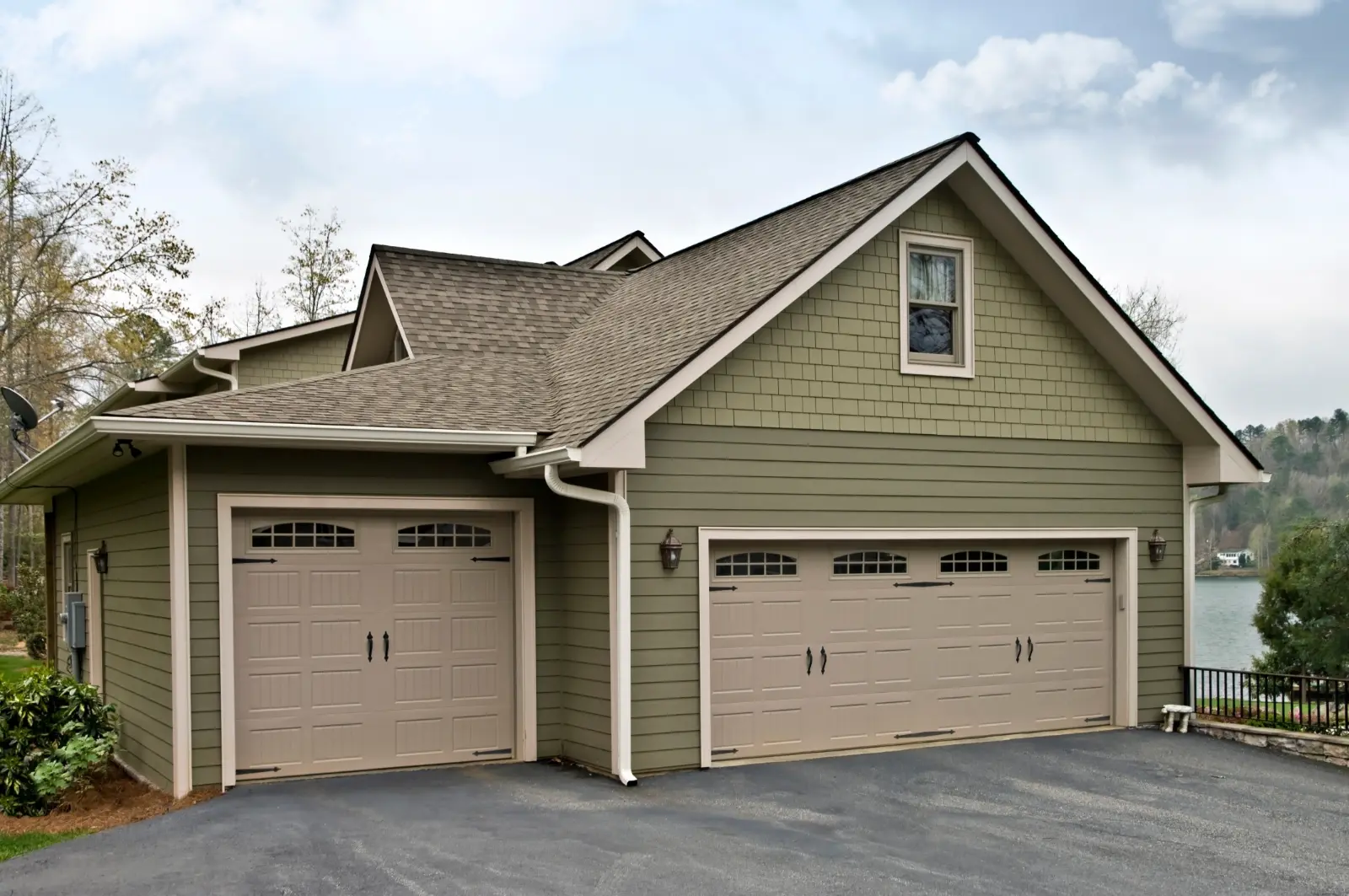 Discover the perfect blend of style and functionality with our Garage Doors on a House. Trusted Door Sales and Services for your home.