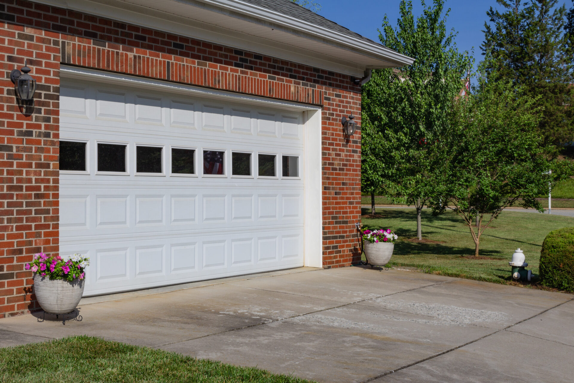 Services Cover Garage Door. Custom metal garage door on a home