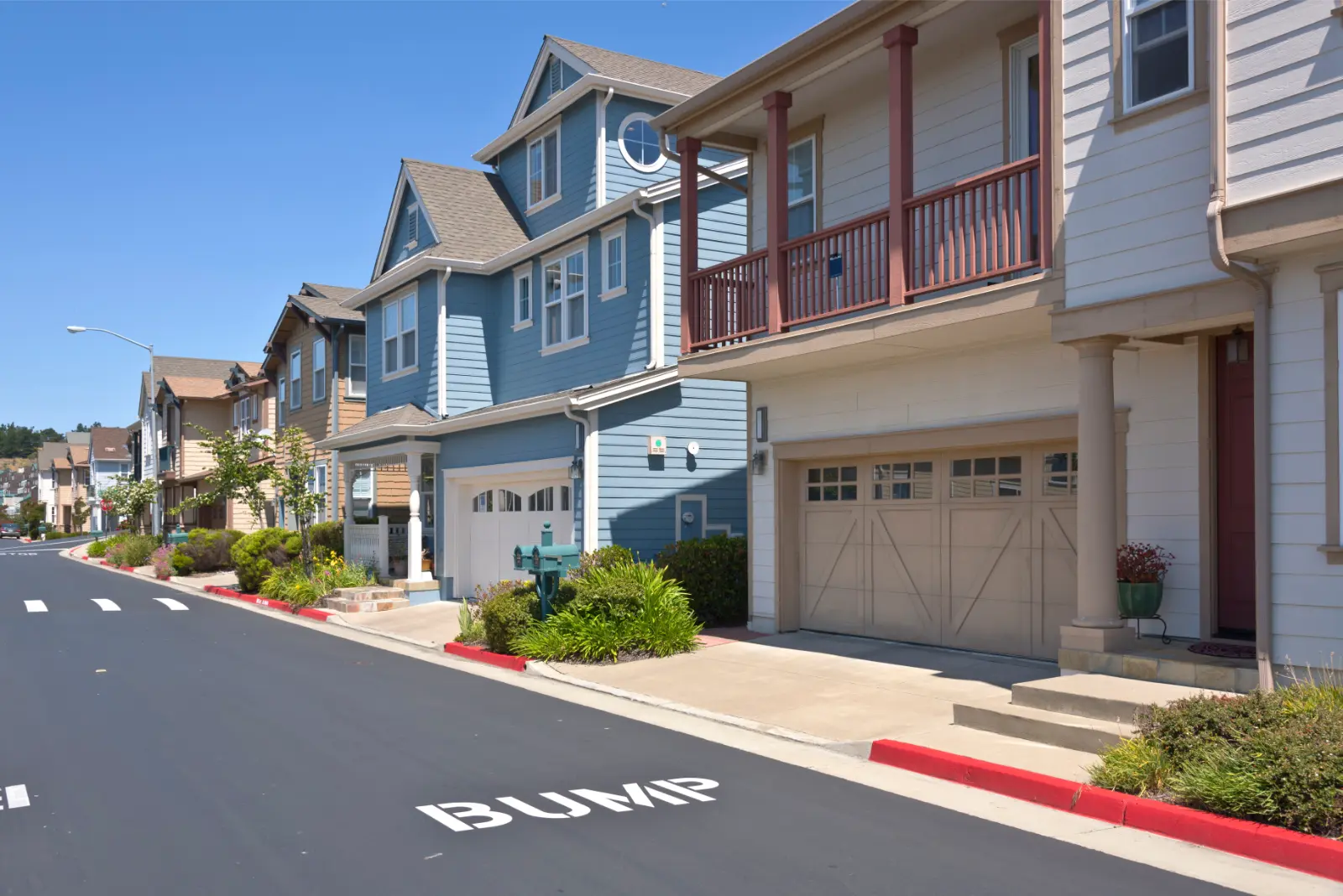 Fixing Your Garage Door. New homes in Richmond California on a hillside