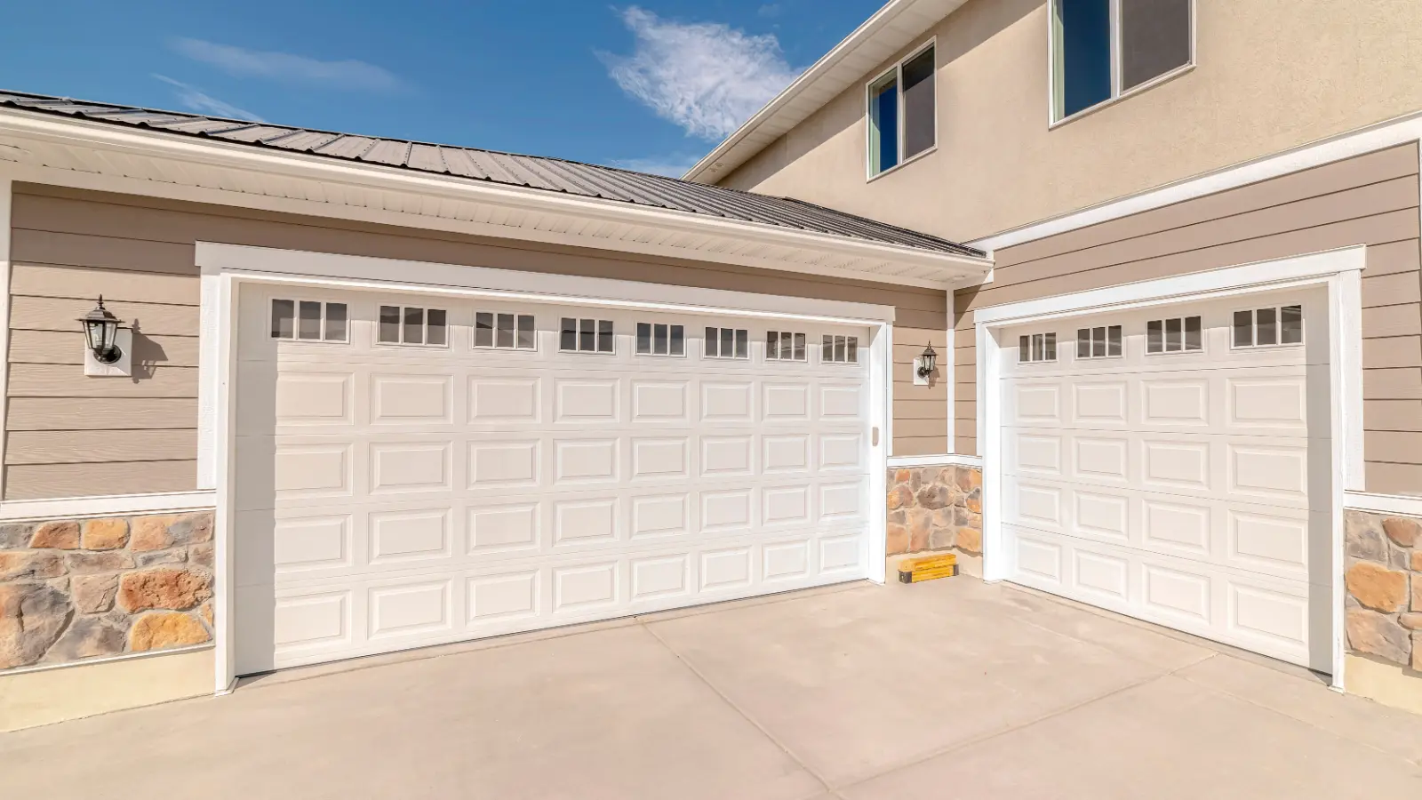 Garage Door Installation Services Reviewed with a Panorama frame Drive way and garage of modern two storey home