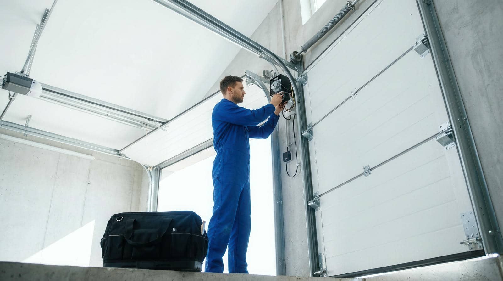Torsion vs Extension Garage Door Springs: Which One Does Your Door Use?