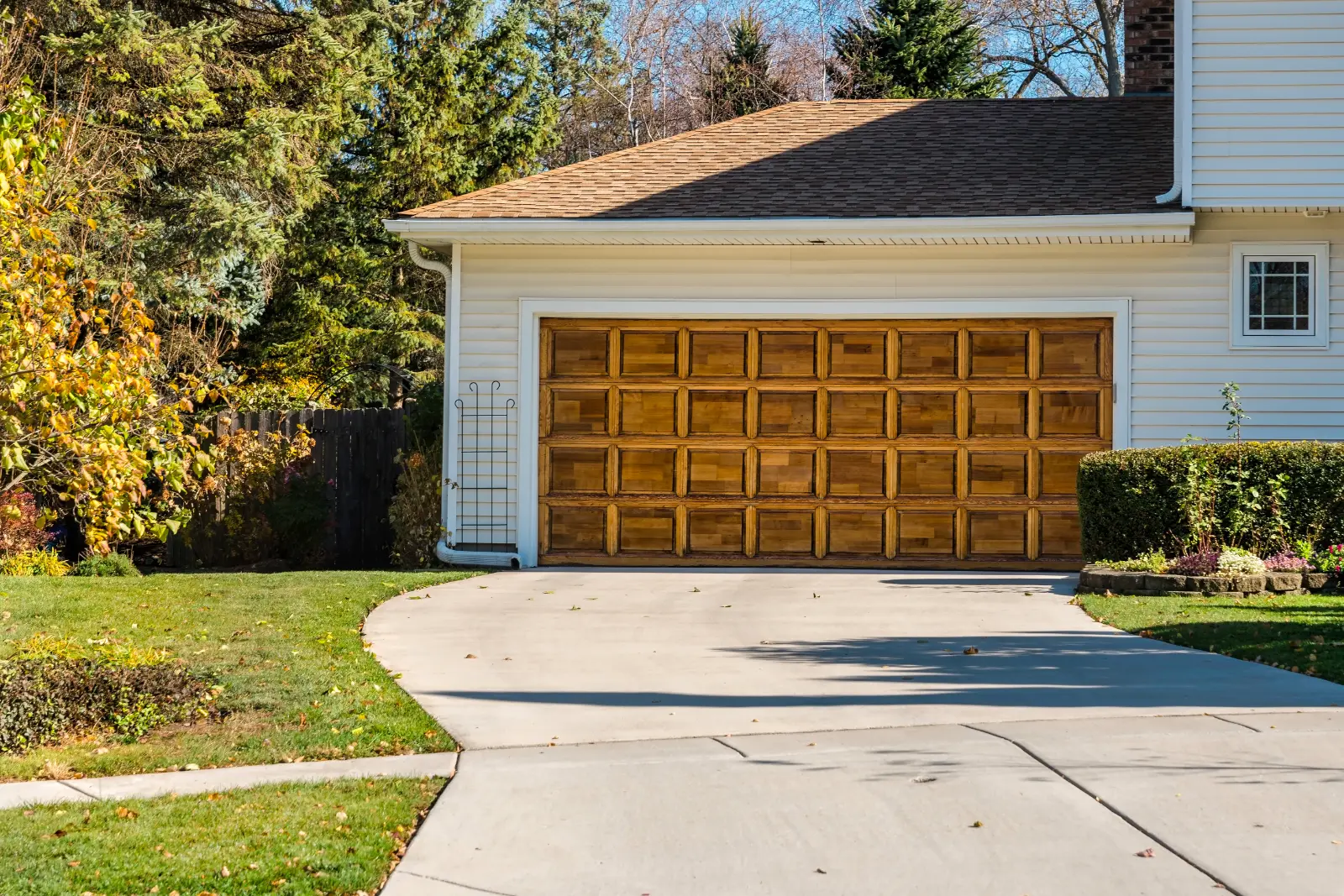 Top High-Quality Garage Door. Traditional old wooden car garage door with driveway