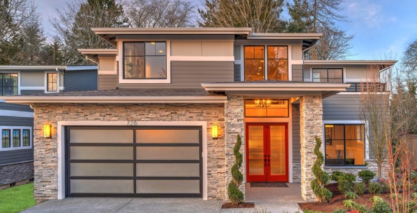 Adding windows to your garage door can be simple, like row, or modern and complex (shown) where windows are the primary panels.
