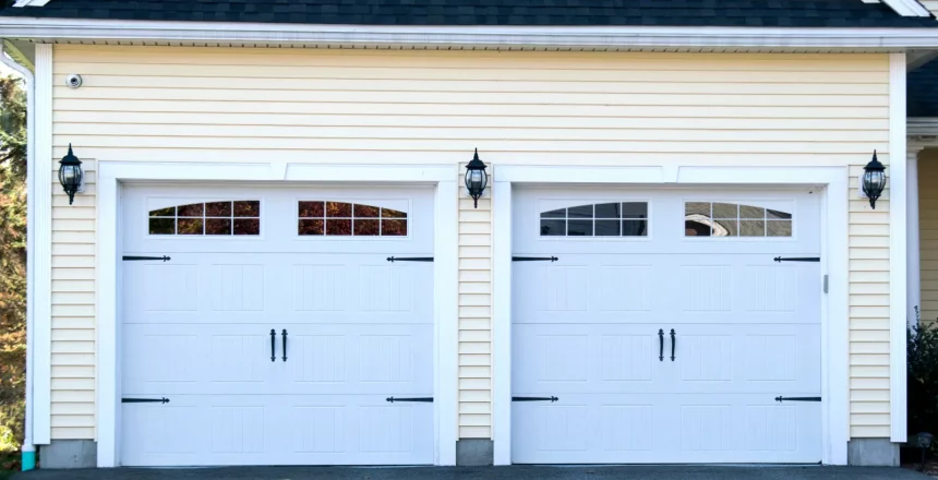 Garage Door Safety Features. Two Car Garage with white doors and windows