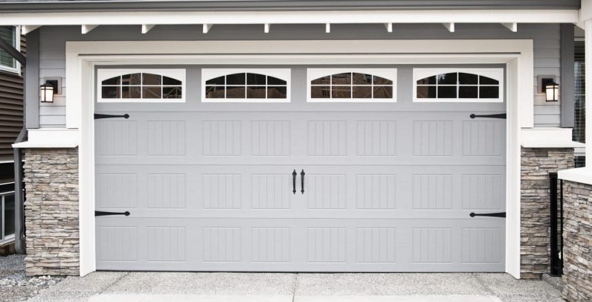 A muted gray garage door, one of the favorite garage door color ideas of 2022.