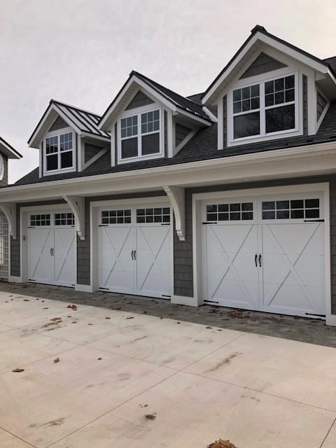 Environmental Door explains how heavy is a garage door.