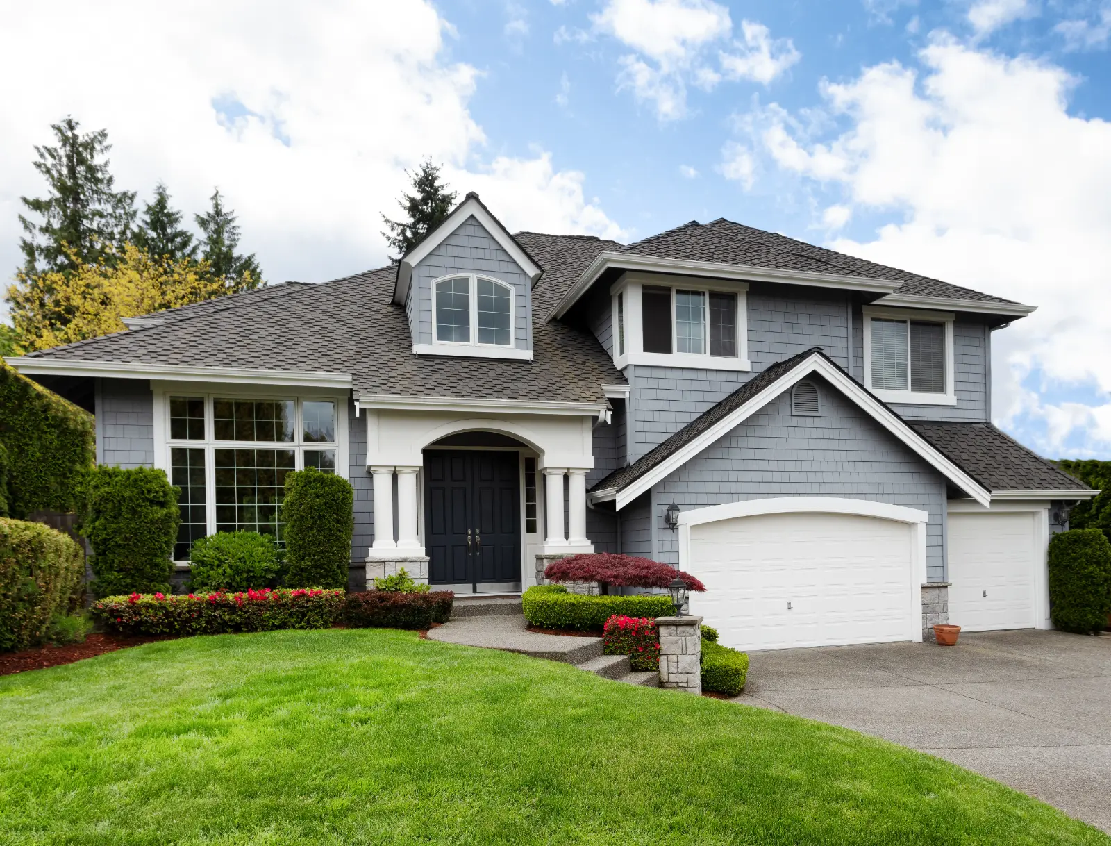 large family home exterior front view of a Local Garage Door