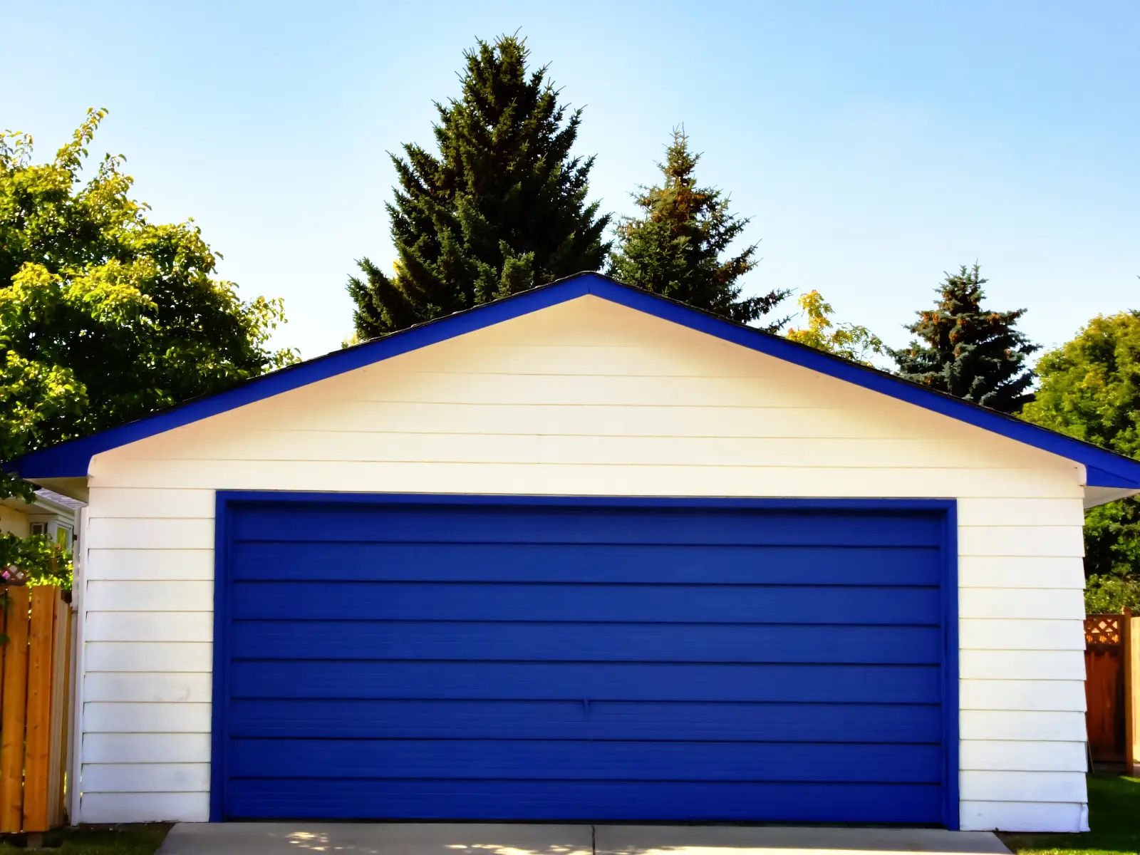 metal garage with blue-door Browse our range for stylish Garage Door Models that elevate your home's exterior appeal.