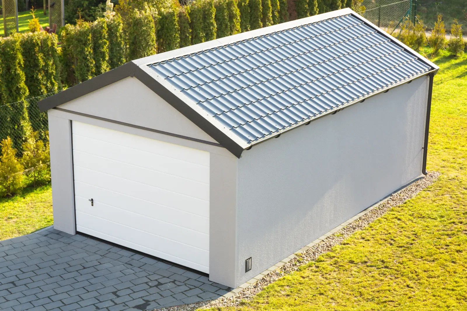 simple metal garage with Energy-Efficient Garage Door for sustainable and eco-friendly solutions.