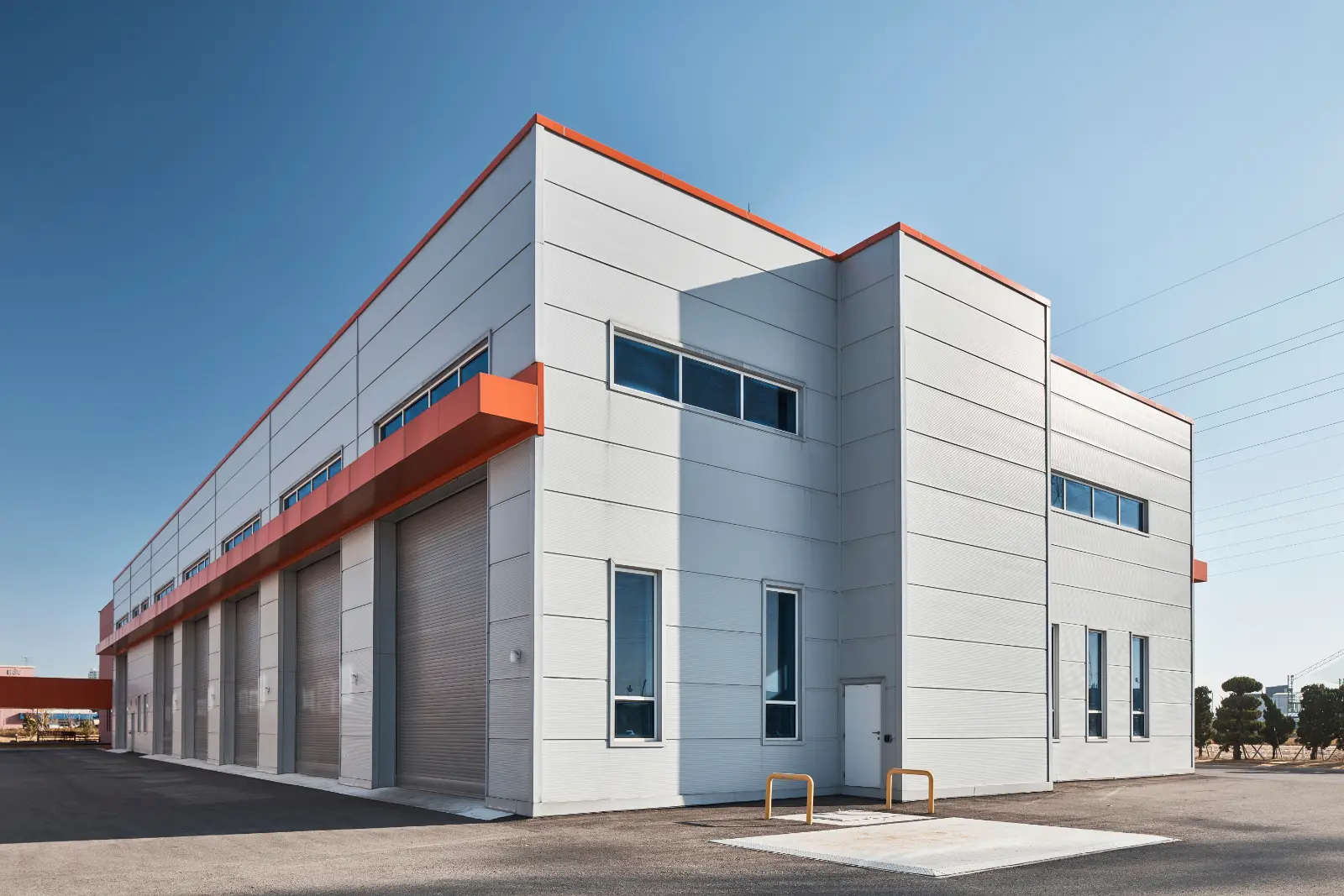 Sleek modern warehouse building with local garage door installation for optimal functionality and style